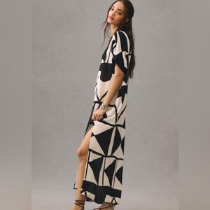 Anthropologie Bel Kazan Poppy Kaftan very versatile size and has pockets.